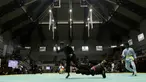 Pesilat saat beraksi pada ajang Kejurnas Pagar Nusa di Padepokan Pencak Silat TMII, Jakarta, Minggu (6/1/2020). Sebanyak 487 pesilat dari seluruh Indonesia berpartisipasi dalam Kejurnas sekaligus Harlah ke-34 Pagar Nusa. (Bola.com/M Iqbal Ichsan)