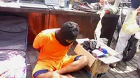 Pelaku pencurian dengan barang bukti ratusan pakaian dalam wanita ditangkap Polsek Singosari Malang, Jawa Timur (Zainul Arifin/Liputan6.com)