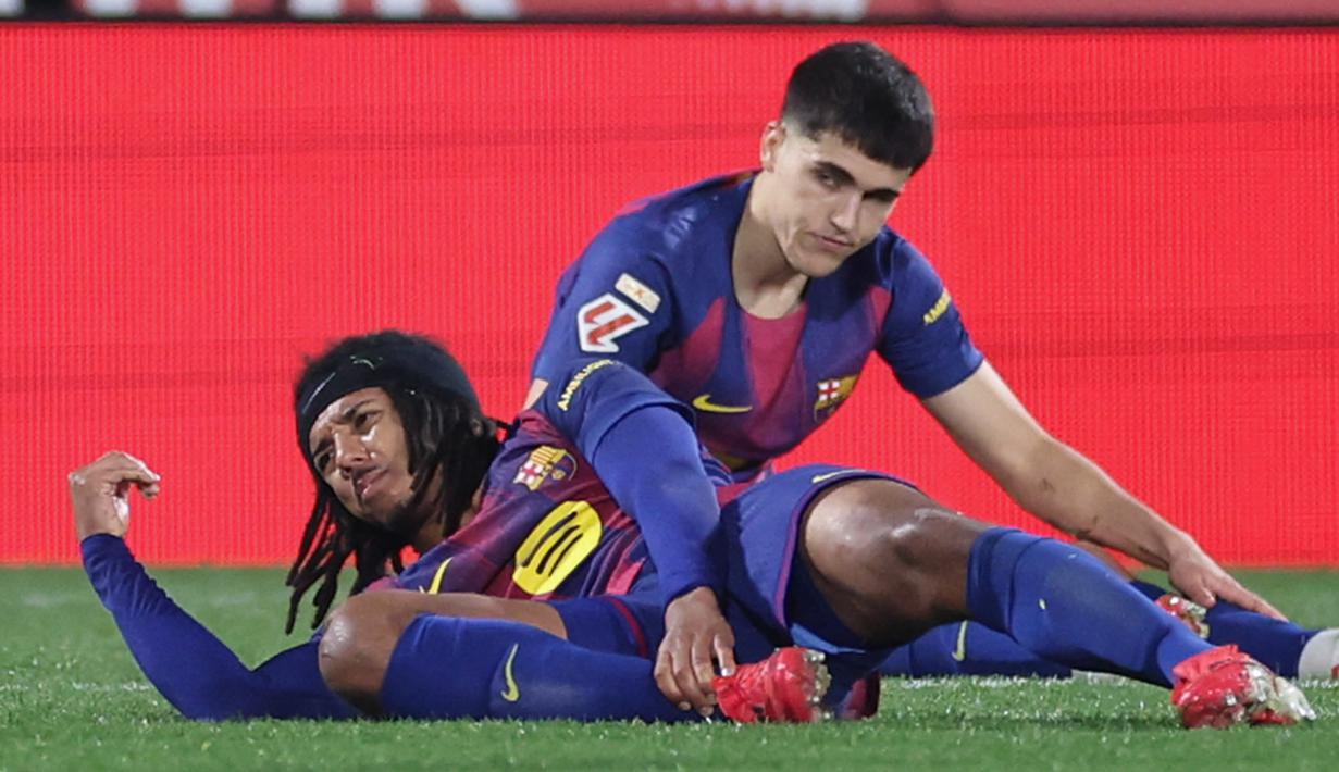 Kini Barcelona tertinggal dua poin dari Real Madrid di posisi teratas puncak klasemen Liga Spanyol. (AFP/Josep Lago)