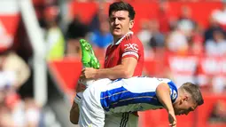 Harry Maguire sempat mengalami cedera hamstring saat membela Timnas Inggris pada 26 September 2022 melawan Jerman. Meski telah terlihat kembali melakukan sesi latihan pada 21 Oktober 2022 lalu bersama Manchester United, ia diketahui belum sembuh total dan masih akan absen dari lapangan hijau. (AFP/Lindsey Parnaby)