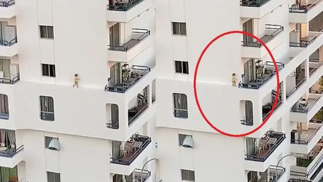 bocah lari di tembok luar apartemen