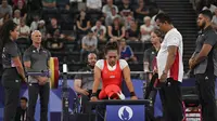 Atlet para-angkat berat Indonesia, Ni Nengah Widiasih, saat berjuang di ajang Paralimpiade 2024 di Porte de la Chapelle Arena, Paris, Rabu (4/9/2024) malam WIB. (NPC Indonesia)