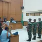 Pengadilan Militer II-08 Jakarta menggelar sidang perdana terkait perkara pembunuhan terhadap Imam Masykur.&nbsp;Agenda sidang perdana yaitu pembacaan dakwaan terhadap tiga terdakwa yakni Praka RM, Praka HS dan Praka J. (Merdeka.com/Nur Habibie)