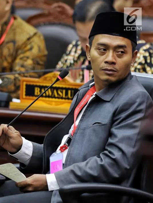 Saksi dari tim hukum Jokowi-Ma'ruf, Anas Nashikin mengikuti sidang lanjutan sengketa Pilpres 2019 di Gedung MK, Jakarta, Jumat (21/6/2019). Sidang tersebut beragendakan mendengar keterangan saksi dan ahli dari pihak terkait yakni paslon nomor urut 01 Jokowi-Ma'ruf Amin. (Liputan6.com/Johan Tallo)