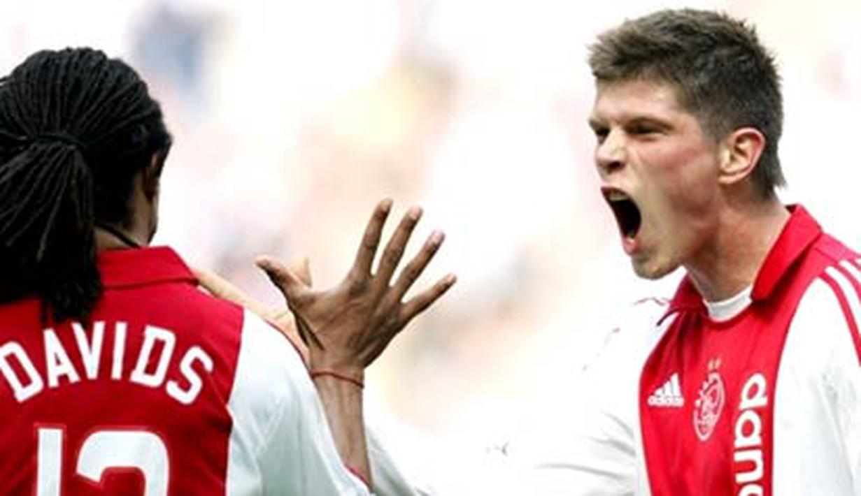Dutch Ajax players Klaas Jan Huntelaar (R) and Edgar Davids cheer after the 3-0 for Ajax on April 20, 2008 during the last match in the Dutch Premier League against Heracles. AFP PHOTO / ANP PHOTO OLAF KRAAK