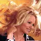 Pamela Anderson mengatakan bahwa mantan suaminya, Tommy Lee pernah menyiksanya secara fisik maupun mental. Anak Pamela pun mengalami hal sama. (STRINGER / BELGA / AFP)
