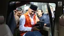 Bupati Kudus, Muhammad Tamzil masuk mobil tahanan usai menjalani pemeriksaan terkait dugaan suap pengisian jabatan perangkat daerah di lingkungan Pemkab Kudus, Gedung KPK Jakarta, Sabtu (27/7/2019). KPK menyita barang bukti uang sebesar Rp170 juta. (Liputan6.com/Helmi Fithriansyah)