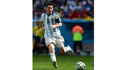Lionel Messi adalah kapten dan penyerang tim Argentina yang hingga kini sudah mencetak 4 gol selama Piala Dunia 2014. (AFP PHOTO/Francois Xavier Marit)