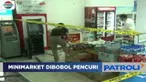 Petugas menemukan tangga dan tambang berwarna hijau yang diduga sebagai alat untuk masuk ke dalam minimarket lewat bangunan yang dibongkar.