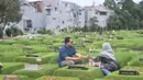 Ziarah makam juga menjadi bentuk penghormatan terhadap orang tua, saudara, atau kerabat yang sudah meninggal dunia. (merdeka.com/Arie Basuki)