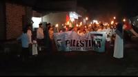 Suasana Burdah keliling untuk mendoakan warga Palestina di Perumahan Griya Utama 2 Kabupaten Bangkalan.
