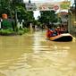 Kondisi di Perumahan Villa Nusa Indah 1 dan 2 Desa Bojongkulur, Kecamatan   Gunungputri, Kabupaten Bogor yang kembali terendam banjir, Senin (8/2/2021) pagi. (Liputan6.com/Achmad Sudarno)