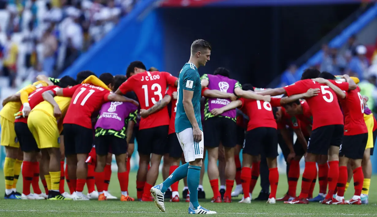 Pada Piala Dunia 2018 di Rusia prestasi Jerman hancur lebur. Untuk pertama kalinya mereka gagal lolos dari fase grup sejak tahun 1938. Hanya menang sekali atas Swedia 2-1, Jerman 2 kali kalah, dari Meksiko 0-1 dan Korea 0-2 di partai terakhir grup. (AFP/Benjamin Cremel)