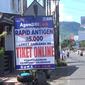 Klinik rapid test antigen di kawasan Pelabuhan Ketapang Banyuwangi ramai- ramai turunkan tarif. (Hermawan Arifianto/Liputan6.com)