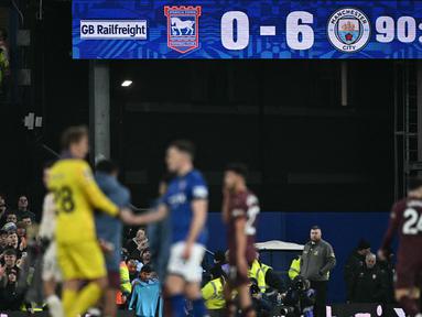 Skor akhir pertandingan Ipswich Town melawan Manchester City pada laga lanjutan Liga Inggris 2024/2025 yang berlangsung di Portman Road, Ipswich, Inggris, Senin (20/01/2025) WIB. (AFP/Ben Stansall)