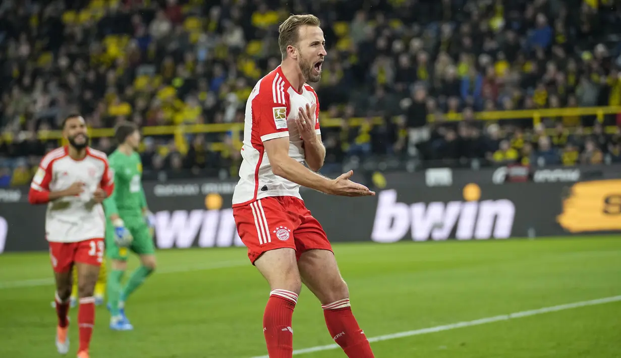 Rekor pertama yang diukirkan Harry Kane di laga ini adalah ia menjadi salah satu striker tertajam di Bundesliga sepanjang masa. (AP Photo/Martin Meissner)