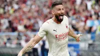 Olivier Giroud yang kini berstatus striker AC Milan juga akan menghadapi Chelsea yang merupakan salah satu mantan klubnya di Liga Inggris. (AFP/Filippo Monteforte)