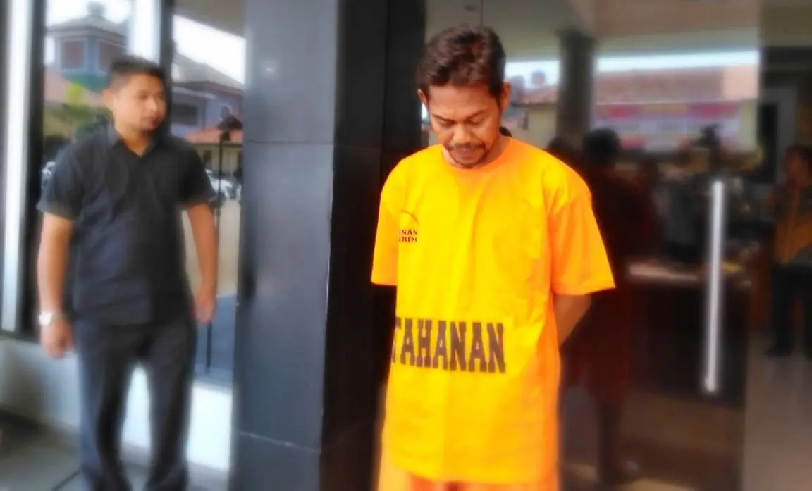 Tersangka persekusi dua bocah di Bekasi, Nur alias Tuyul. (Liputan6.com/Fernando Purba)