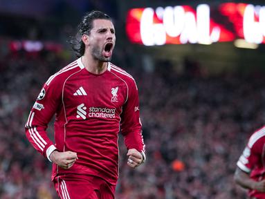 Pemain Liverpool, Dominik Szoboszlai, melakukan selebrasi setelah mencetak gol ke gawang Galatasaray pada leg kedua babak 16 besar Liga Champions 2025/2026 di Stadion Anfield, Kamis (19/3/2026). (AP Photo/Jon Super)