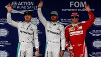 Tiga pebalap yang akan start di posisi depan, Nico Rosberg, Lewis Hamilton, dan Kimi Raikkonen dalam balapan F1 GP Brasil di Sirkuit Interlagos, Minggu (13/11/2016). (AFP/Miguel Schincariol)