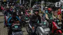 Hingga saat ini, 2.423 peserta dengan 1.008 unit sepeda motor tercatat untuk keberangkatan gelombang arus balik kedua dengan KM Dobonsolo. (Liputan6.com/Angga Yuniar)