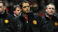 Ekspresi striker Manchester United asal Meksiko Javier Hernandez (tengah) sebelum laga penyisihan Grup C Liga Champions melawan Benfica di Old Trafford, 22 November 2011. AFP PHOTO / ANDREW YATES