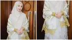 Laudya Cynthia Bella berperan sebagai Siti Raham istri Buya Hamka di film Buya Hamka. Hadiri gala premiere film Buya Hamka, sahabat Zaskia Sungkar itu pakai baju Minang lengkap dengan aksesori dan selendangnya. Polesan makeup dan warna jilbab yang senada membuat Bella kian memesona. Setelah lama tak muncul di layar lebar, film tersebut tentunya mengobati kerinduan penggemar terhadap akting Laudya Cynthia Bella. (Liputan6.com/IG/@laudyacynthiabella)