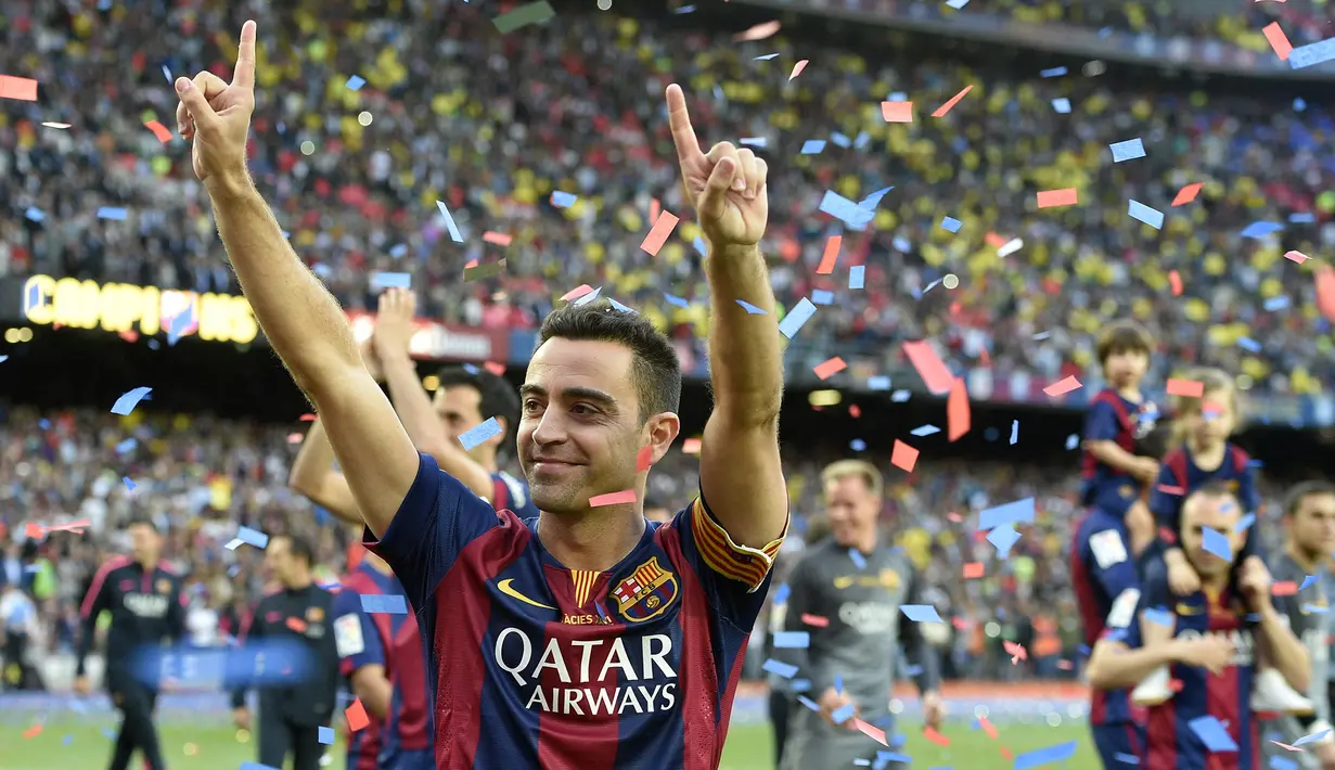 Xavi Hernandez. Gelandang elegan Barcelona ini menempati posisi ke-3 di tiga edisi, 2009-2011. Hanya ketidakberuntungan saja yang membuatnya gagal, yakni berada satu tim dengan Lionel Messi. (AFP/Lluis Gene)