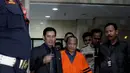 Rusli Sibua usai menjalani pemeriksaan di Gedung KPK, Jakarta, Rabu (8/7/2015). Rusli dijemput paksa oleh penyidik dari Hotel Grand Melia, Jakarta akibat selalu mangkir. (Liputan6.com/Helmi Afandi)