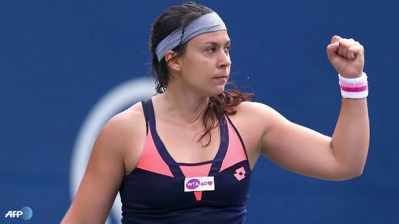 marion-bartoli-pensiun-130815b.jpg