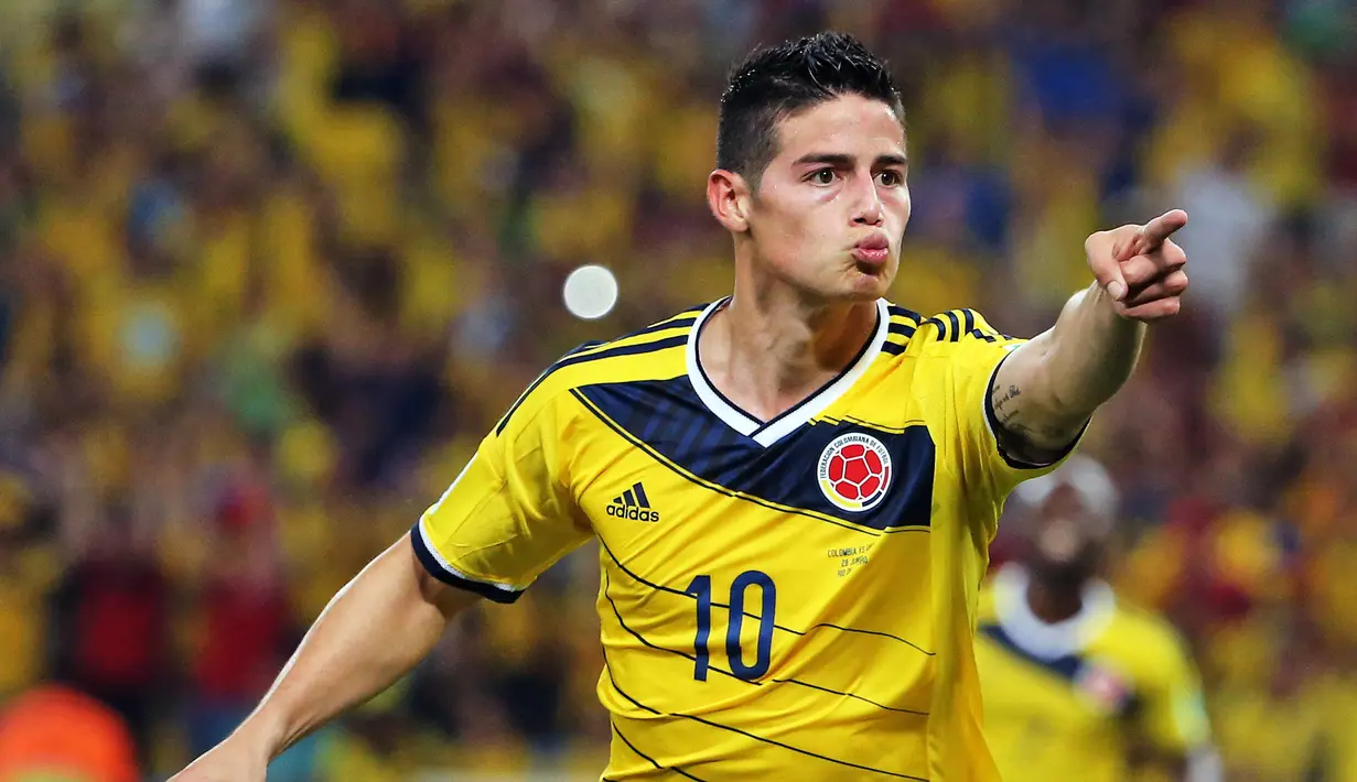 Bintang Kolombia, James Rodriguez menjadi penerima FIFA Puskas Award 2014 melalui gol cantiknya pada ajang Piala Dunia 2014. James mengalahkan Robin Van Persie yang juga masuk dalam nominasi. (EPA/Paolo Aguilar)