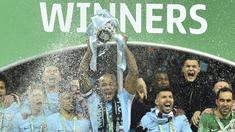 Para pemain Manchester City merayakan gelar juara Piala Liga usai mengalahkan Arsenal di Stadion Wembley, London, Minggu (25/2/2018). City menang 3-0 atas Arsenal. (AFP/Glyn Kirk)