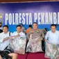 Uang Rp3,2 miliar diduga hasil jualan narkoba yang disita oleh Polresta Pekanbaru dari bandar narkoba jaringan internasional. (Liputan6.com/M Syukur)