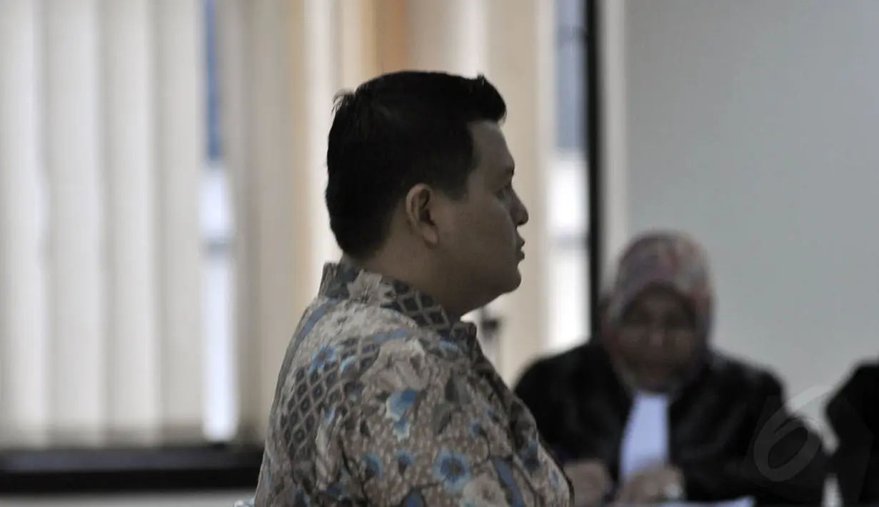 Teddy Renyut terbukti bersalah dan memberi uang suap SGD 100 ribu kepada Bupati Biak Numfor Yesaya Sombuk, Jakarta, Rabu (29/10/2014). (Liputan6.com/Miftahul Hayat)