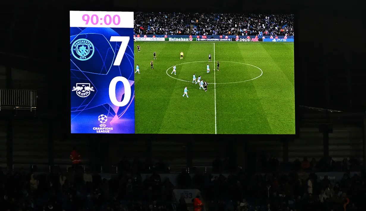 <p>Papan skor pada laga leg kedua 16 Besar Liga Champions 2022/2023 antara Manchester City melawan RB Leipzig di Etihad Stadium, Manchester, Rabu (15/03/2023). The Cityzens berhasil melaju ke babak perempat final setelah berhasil menang dengan skor 7-0. (AFP/Oli Scarff)</p>