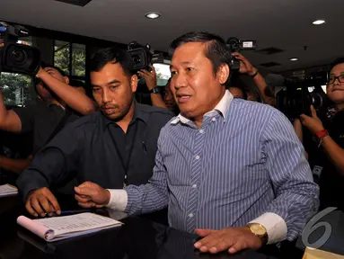 Komisioner Komisi Yudisial (KY) Taufiqurrahman Syahuri mendatangi kantor KPK, Jakarta, Selasa (30/9/2014) (Liputan6.com/Miftahul Hayat)