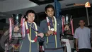 Liliyana Natsir dan Tontowi Ahmad menjadi kampiun di kelas ganda campuran Kejuaraan Dunia Bulutangkis 2013 (Liputan6.com/ Helmi Fithriansyah).