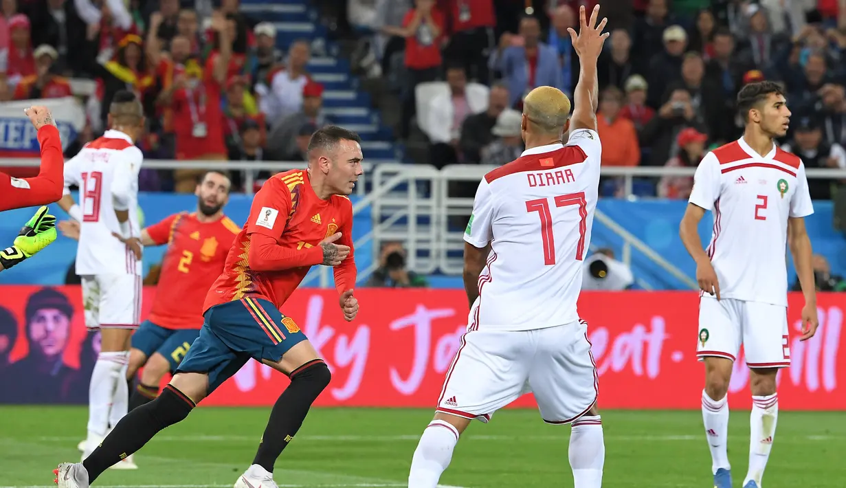 Striker Spanyol, Iago Aspas, merayakan gol ke gawang Maroko pada laga grup B Piala Dunia di Stadion Kaliningrad, Kaliningrad, Senin (25/6/2018). Kedua negara bermain imbang 2-2. (AFP/Patrick Hertzog)