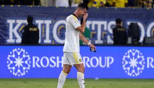 Cristiano Ronaldo menangis usai membawa Al Nassr menjadi juara Saudi Pro League 2025/2026. (Fayez NURELDINE / AFP)