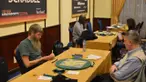 Pria 48 tahun itu sebelumnya menjuarai kejuaraan scrabble berbahasa Inggris dan sejauh ini telah menjuarai English World Scrabble Championships sebanyak tiga kali, US National Championships lima kali dan UK Open enam kali.