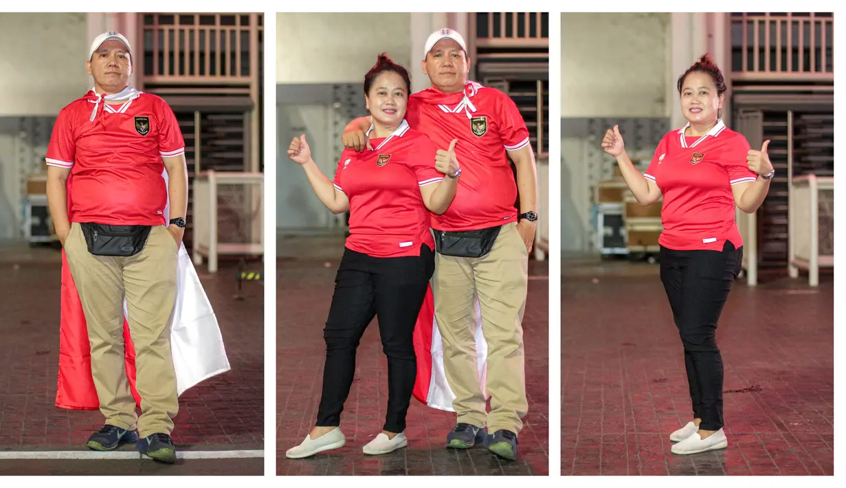 Sepasang suami istri, Faradialah (kiri) dan Winda (kanan) saat datang nonton bareng laga semifinal Piala Asia U-23 antara Timnas Indonesia U-23 melawan Uzbekistan U-23 di Kompleks Stadion Utama Gelora Bung Karno (SUGBK), Senayan, Jakarta, Senin (30/04/2024). (Bola.com/Bagaskara Lazuardi)