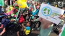 Masyarakat dan relawan mengikuti kampanye untuk memperingati Hari Cerebral Palsy Sedunia di kawasan Car Free Day, Jakarta, Minggu (13/10/2019). Peringatan yang jatuh 6 Oktober itu dimanfaatkan untuk mensosialisasikan dan menggalang kepedulian bagi penyandang cerebral palsy (Liputan6.com/Johan Tallo)
