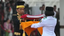 Ini menjadi kali pertama peringatan HUT RI digelar di dua tempat. (AP Photo/Achmad Ibrahim)