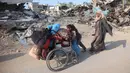 Badan pertahanan sipil Gaza mengumumkan pada 5 November 2024 bahwa setidaknya 13 orang, termasuk beberapa orang yang tinggal di tenda-tenda pengungsi Palestina, tewas dalam serangan udara Israel yang dilakukan pada malam hari. (Omar AL-QATTAA/AFP)