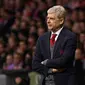 Reaksi manajer Arsenal, Arsene Wenger melihat timnya melawan Atletico Madrid pada laga leg kedua semifinal Liga Europa di Wanda Metropolitano, Kamis (3/5). Kekalahan Arsenal membuat Wenger mencatat perpisahan yang mengecewakan (AFP/PIERRE-PHILIPPE MARCOU)