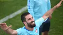 Kapten Timnas Turki yang bermain di Barcelona, Arda Turan, mungkin akan tetap berpuasa selama bertanding di Piala Eropa 2016 seperti turnamen lain yang ia jalani sebelumnya. (AFP/Bulent Kilic)