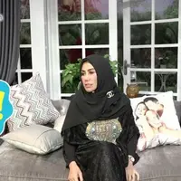 Amy Qanita sempat kaget saat melihat foto tiket anaknya, Raffi Ahmad dan Ayu Ting Ting.