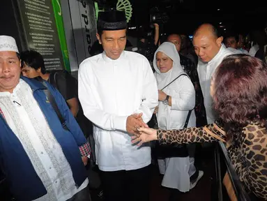 Setelah merampungkan berbagai agenda kampanye, Capres Jokowi pergi menunaikan umrah, Minggu (07/07/14) (Liputan6.com/Faizal Fanani)