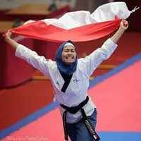 Defia Rosmaniar sumbang medali emas untuk Indonesia di Asian Games 2018. (Bola.com.Peksi Cahyo)