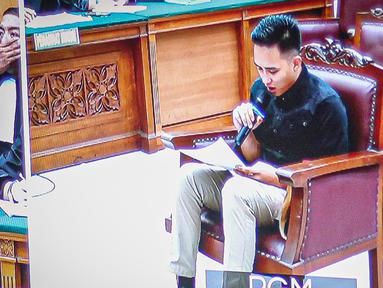 Terdakwa kasus pembunuhan berencana Brigadir Yosua Hutabarat, Richard Eliezer alias Bharada E menjalani sidang tuntutan di Pengadilan Negeri Jakarta Selatan, Jakarta, Rabu (25/1/2023). Sidang tersebut beragenda pembacaan nota pembelaan atau pledoi dari terdakwa. (Liputan6.com/Faizal Fanani)